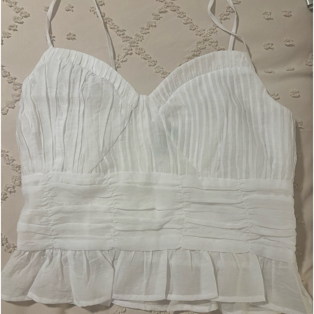 White top from Express, brand new. Never worn. Size M.